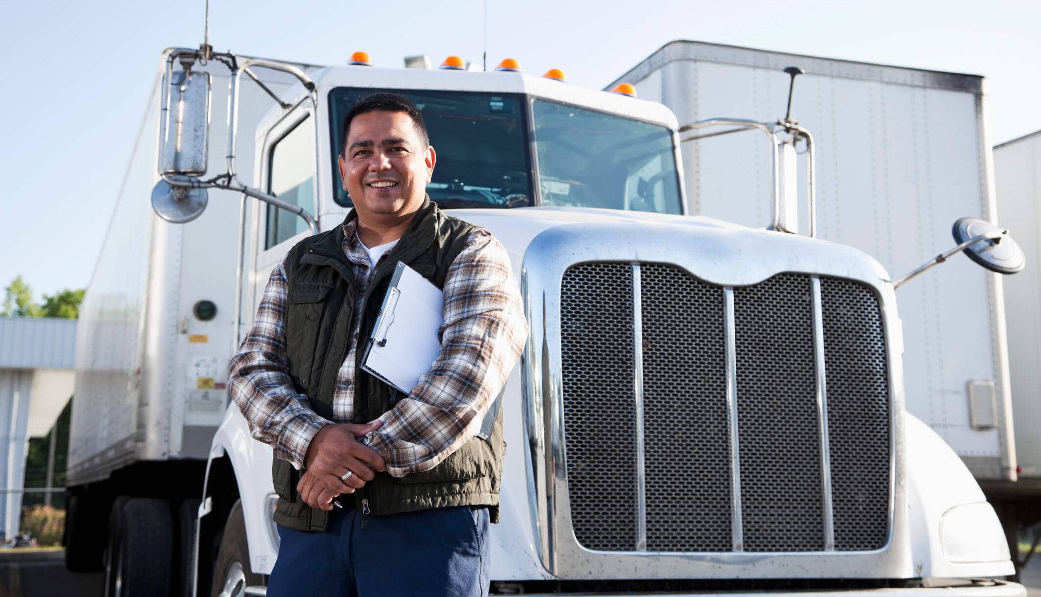 Immigrating to Canada and Working as a Truck Driver: A driver with his truck