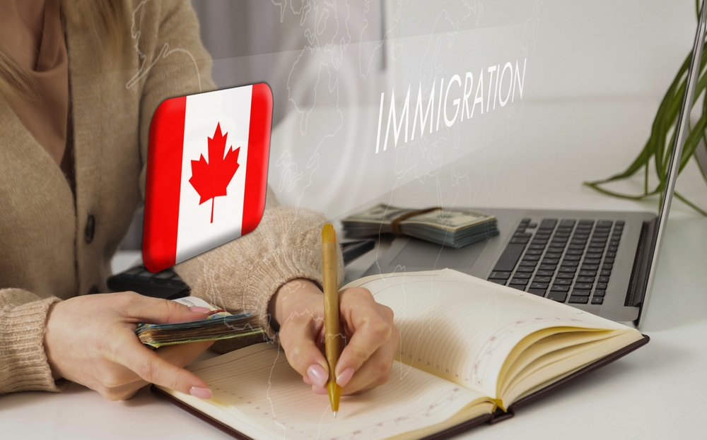 Canada Visa Eligibility: A picture showing a female applicant writing down visa eligibility criteria.