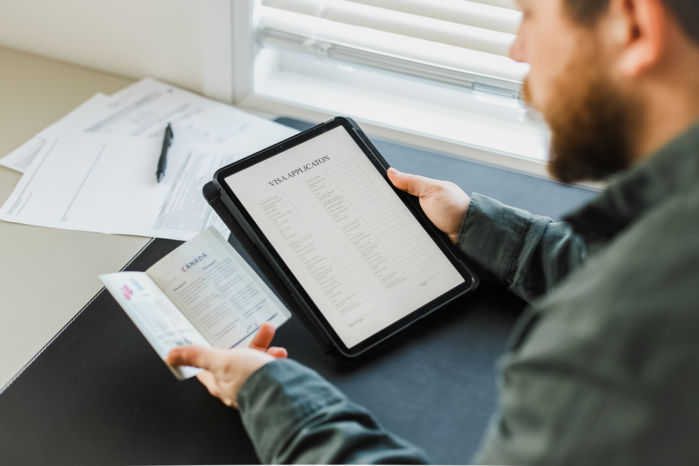 Canada Visa Eligibility: A picture showing a male applicant checking visa eligibility and application.