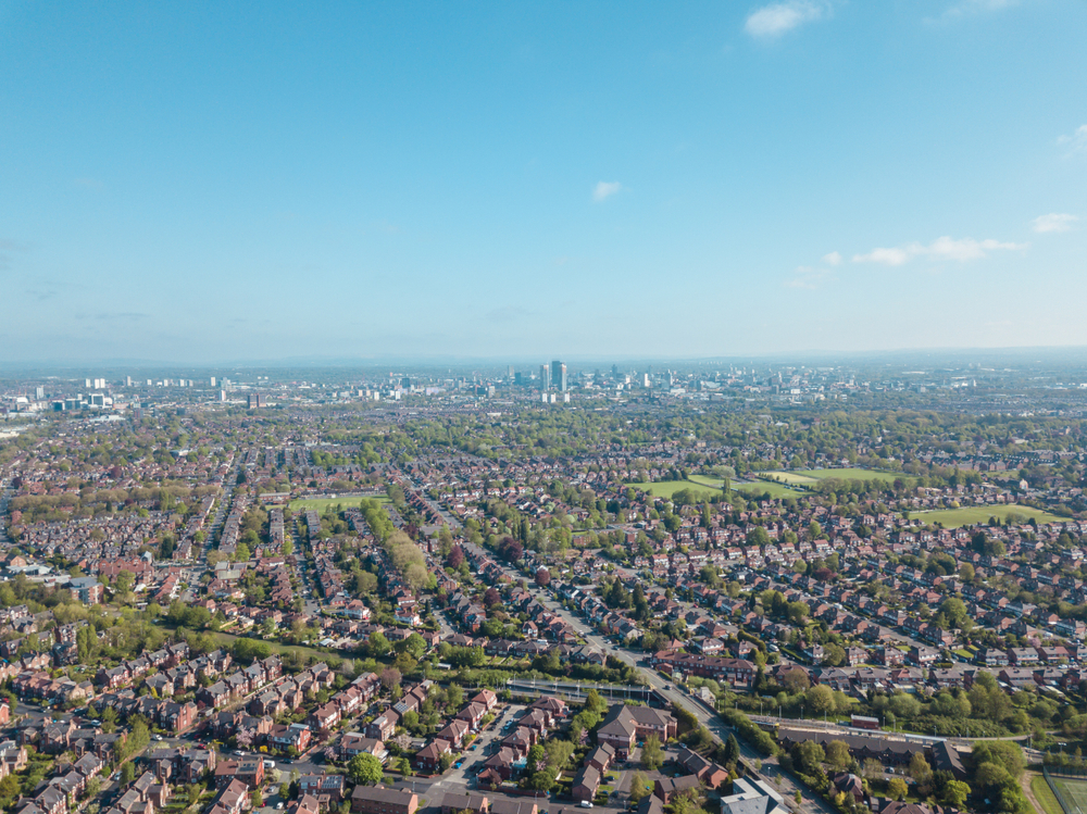 London vs Manchester: Ariel drone view houses in Manchester England Residential